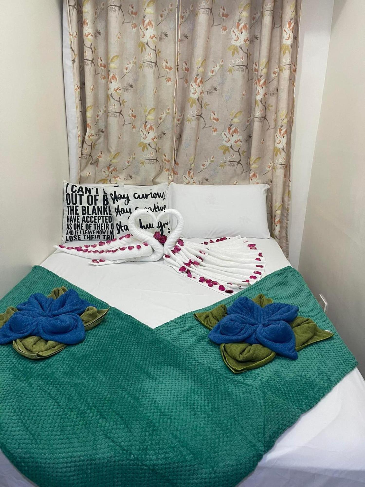 Green Residences Staycation By Pbyy Manila Habitación foto